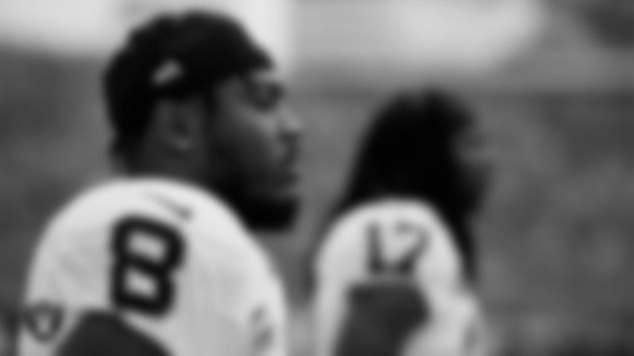 Las Vegas Raiders running back Josh Jacobs (8) during the national anthem before the regular season away game against the Denver Broncos at Empower Field at Mile High.